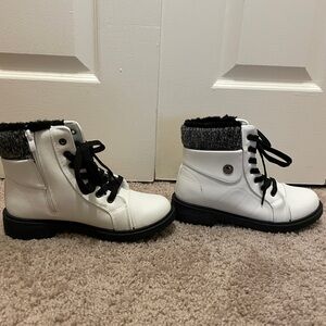 Woman’s white and Black Lace-Up Boots
